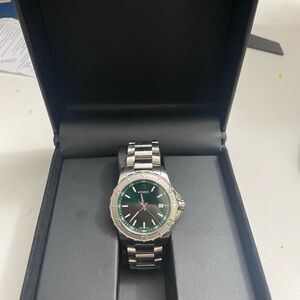 Movado watch green face.